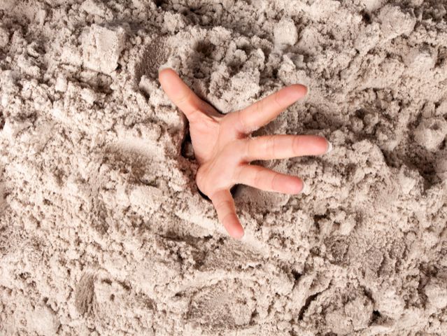 hand in quicksand