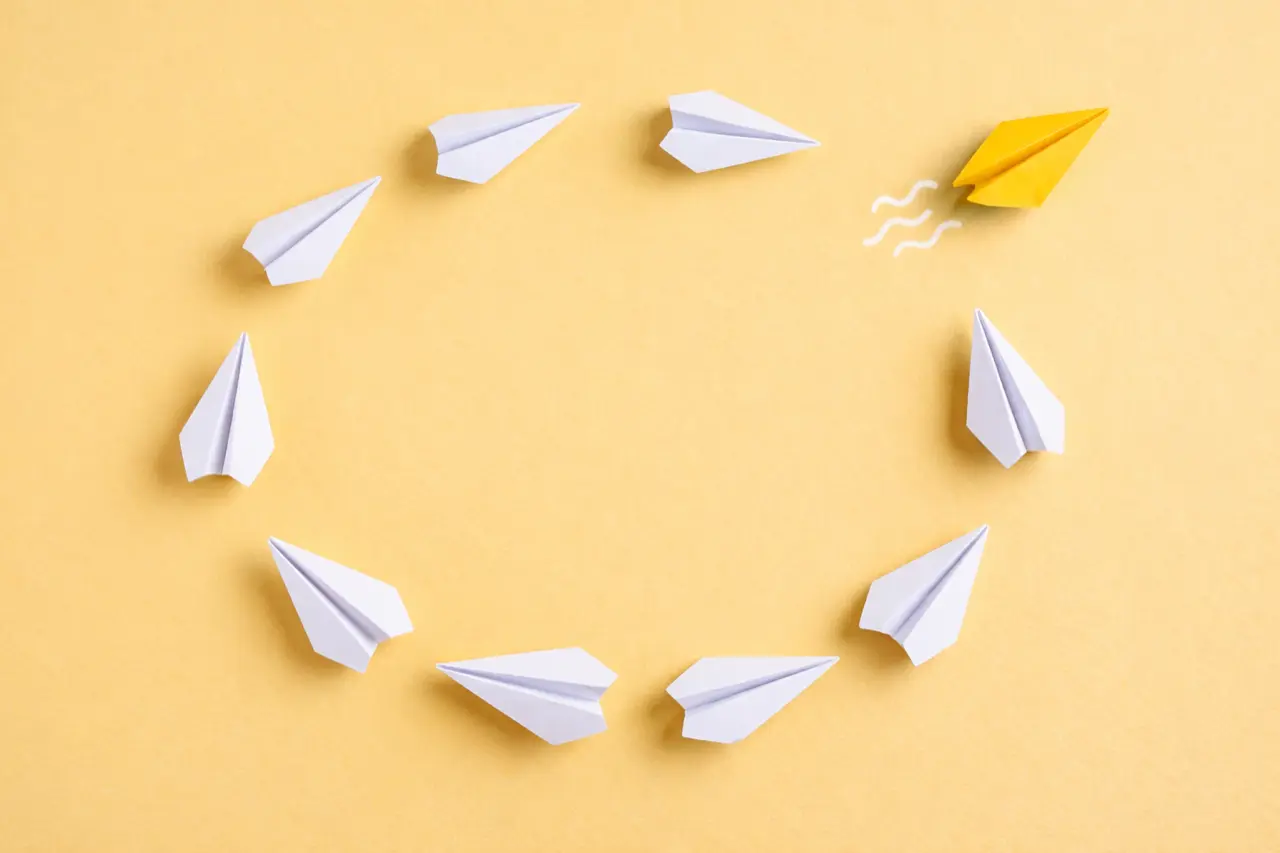the yellow graphic of paper airplanes
