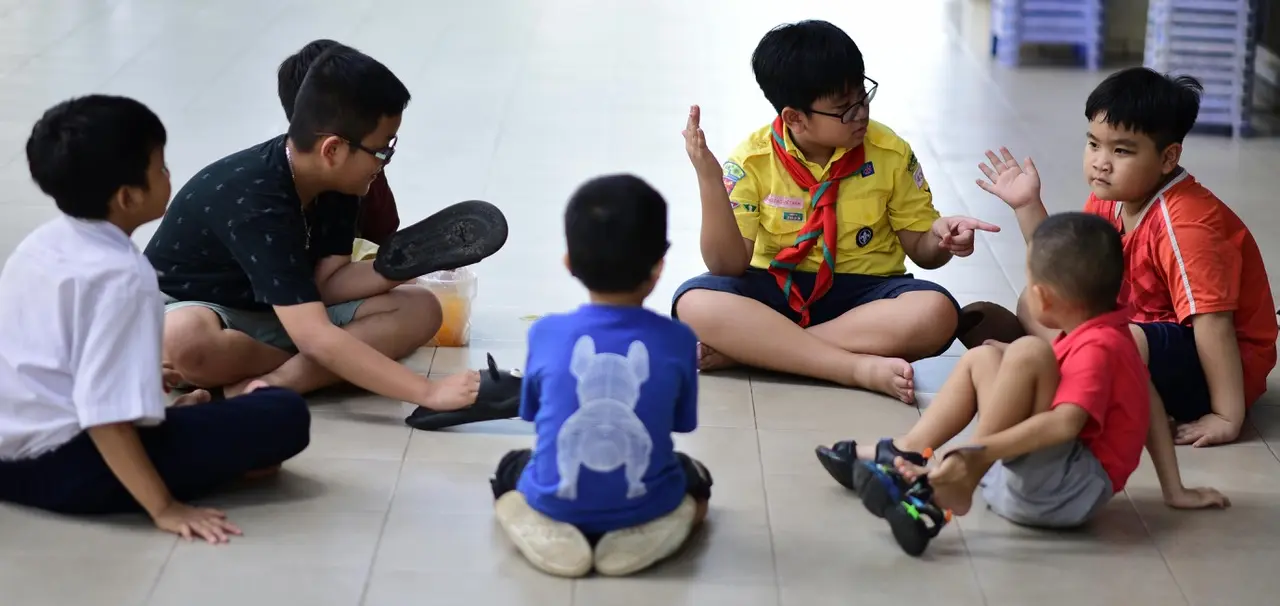 the circle of seated children