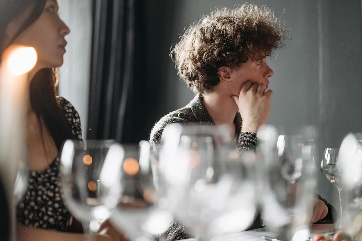 he photo of the people with wine glasses